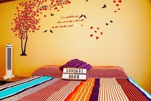 Quarto casal superior, vista para o jardim | Wi-Fi de cortesia, roupa de cama