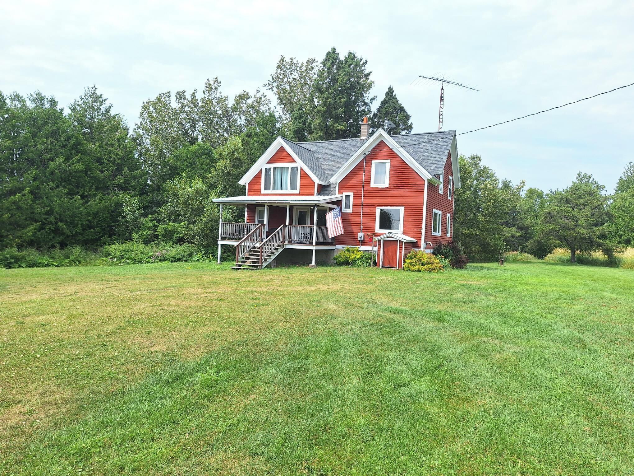Escape to our farmhouse on 79 acres 4 ponds minutes from Calumet and Hancock
