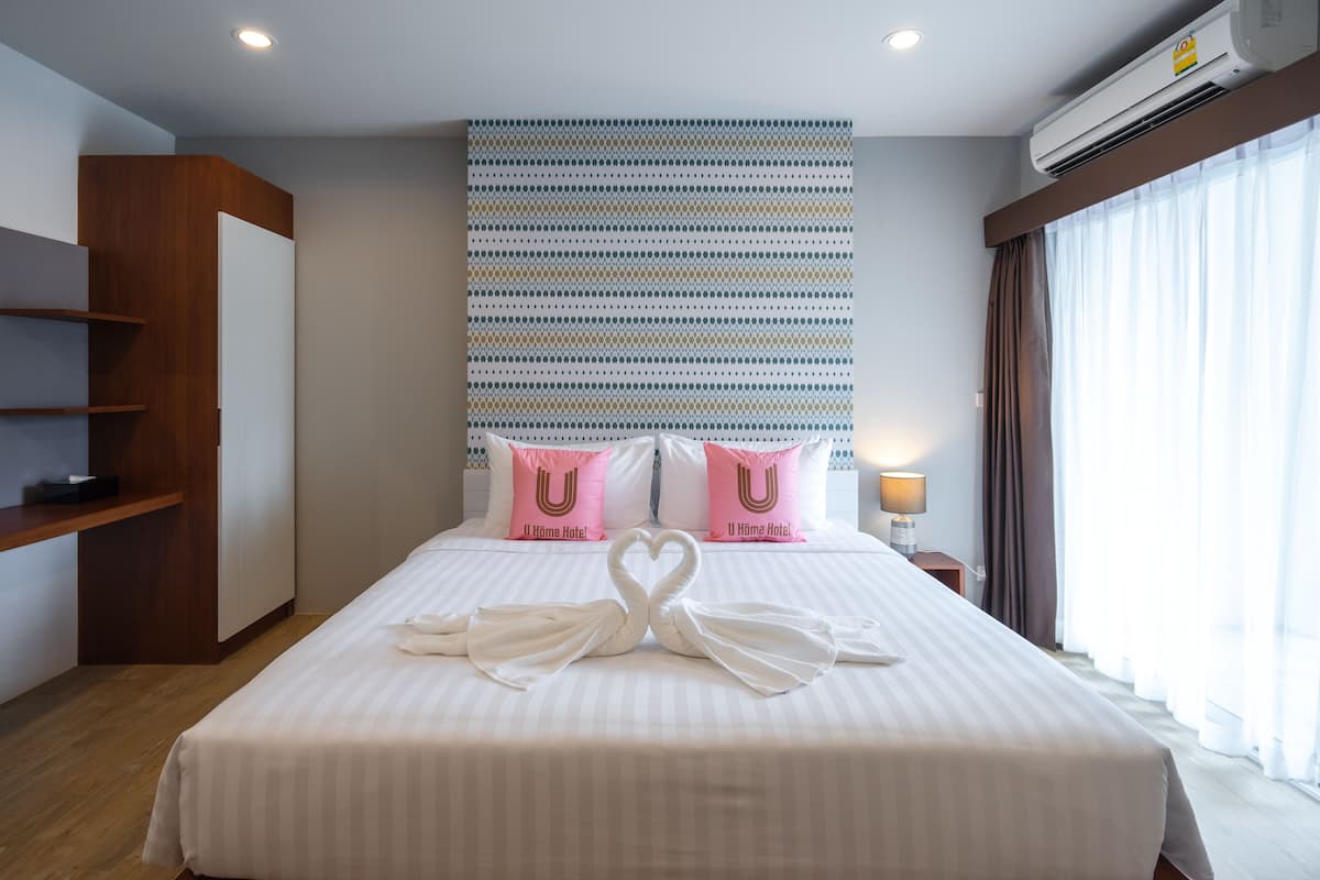 Superior kamer | Luxe beddengoed, een kluis op de kamer, individueel gedecoreerd