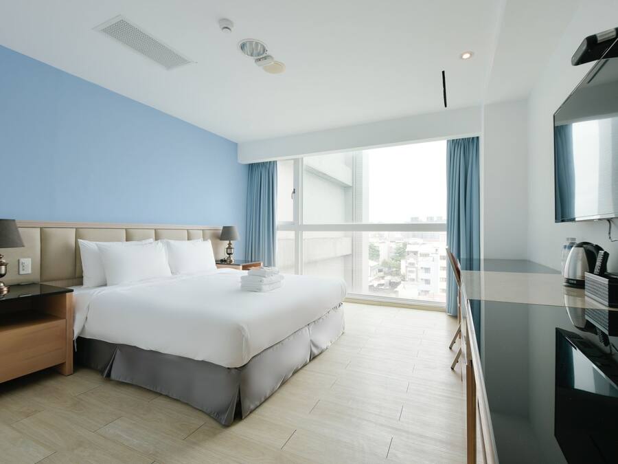 Standard Double Room | Down comforters, desk, laptop workspace, blackout drapes