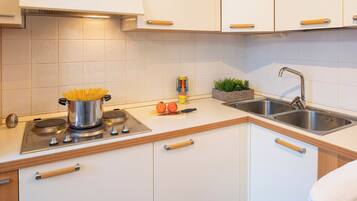 Fridge, stovetop, dishwasher, high chair