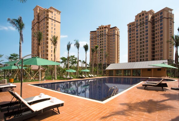 Outdoor pool, pool umbrellas, pool loungers