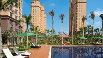 Outdoor pool, pool umbrellas, pool loungers