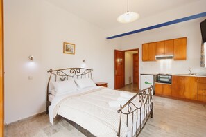 1 غرفة نوم ومكواة/لوح كي وواي فاي وملاءات أسرّة