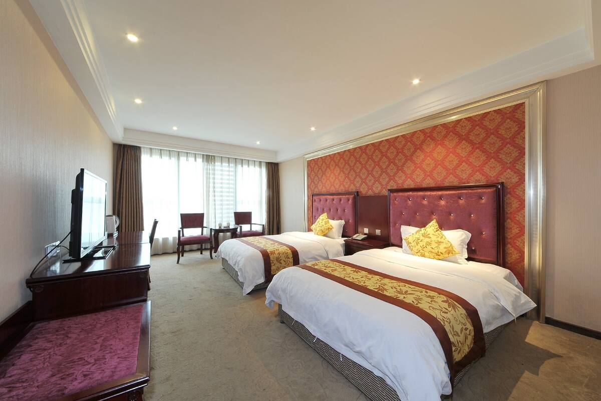 Chambre Affaires double ou avec lits jumeaux | Rideaux d’obscurcissement, accès au Wi-Fi (inclus), literie fournie