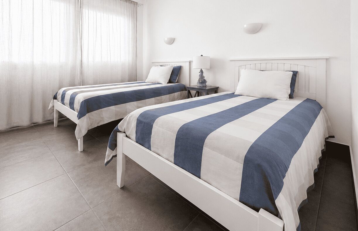 2 bedrooms, travel cot, WiFi, bed sheets