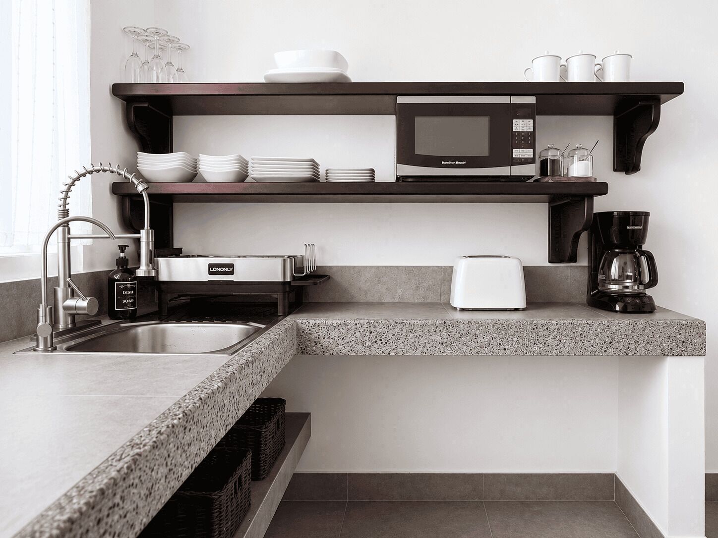 Coffee/tea maker, fridge, microwave, cookware/dishes/utensils