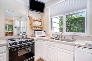 Dishwasher, coffee/tea maker, cookware/dishes/utensils