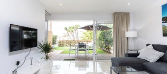 Newly renovated apartment with private garden and pool