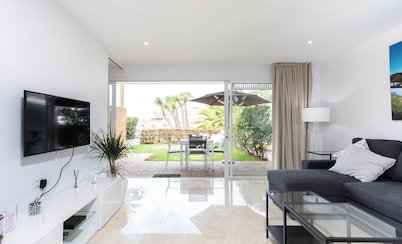 Newly renovated apartment with private garden and pool