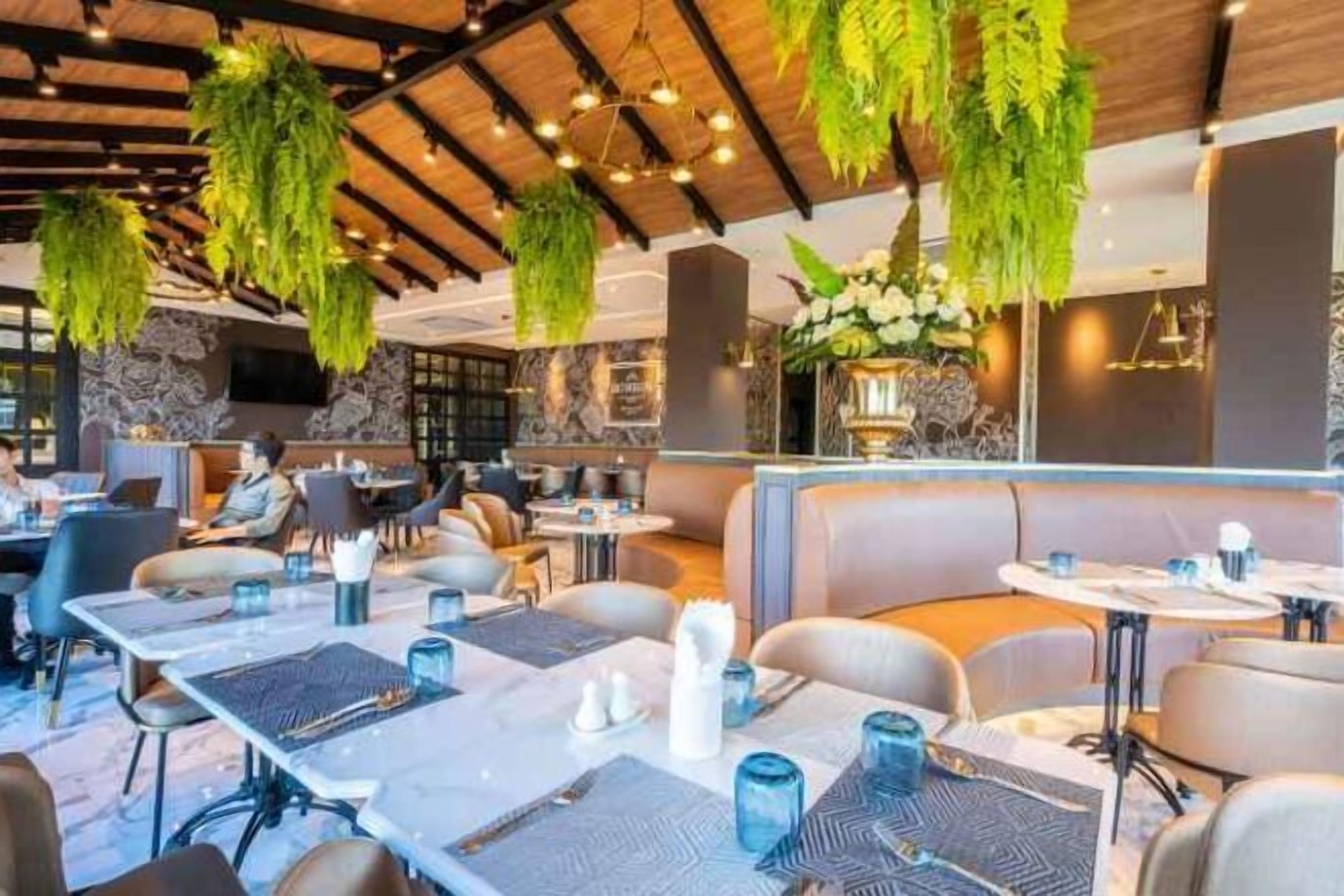 Breakfast, lunch, dinner served; local and international cuisine 