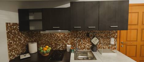 Fridge, oven, electric kettle, toaster