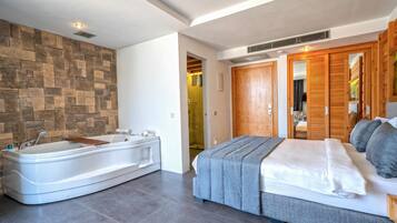 Deluxe-Suite, Whirlpool, Meerblick | 1 Schlafzimmer, Minibar, Zimmersafe, Schreibtisch