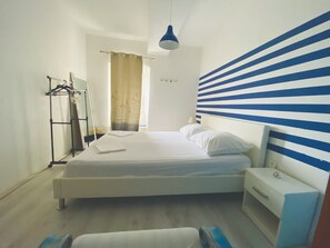 2 dormitorios, tabla de planchar con plancha, wifi gratis y ropa de cama