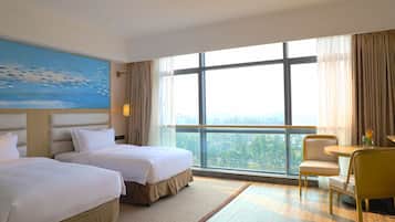 Deluxe Room, Garden View | Premium bedding, in-room safe, desk, blackout drapes