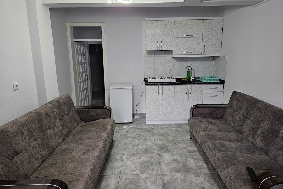 Appartement Familial, 1 chambre | 1 chambre, bureau, rideaux occultants, Wi-Fi gratuit