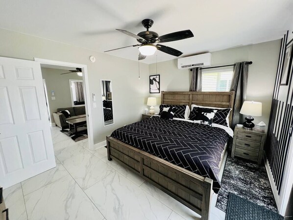 1 bedroom, desk, iron/ironing board, travel crib