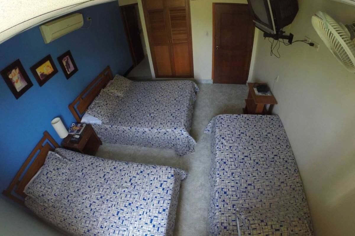 Basic Quadruple Room | Iron/ironing board (on request), WiFi (free), bed sheets