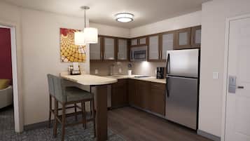 Full-sized fridge, microwave, stovetop, dishwasher