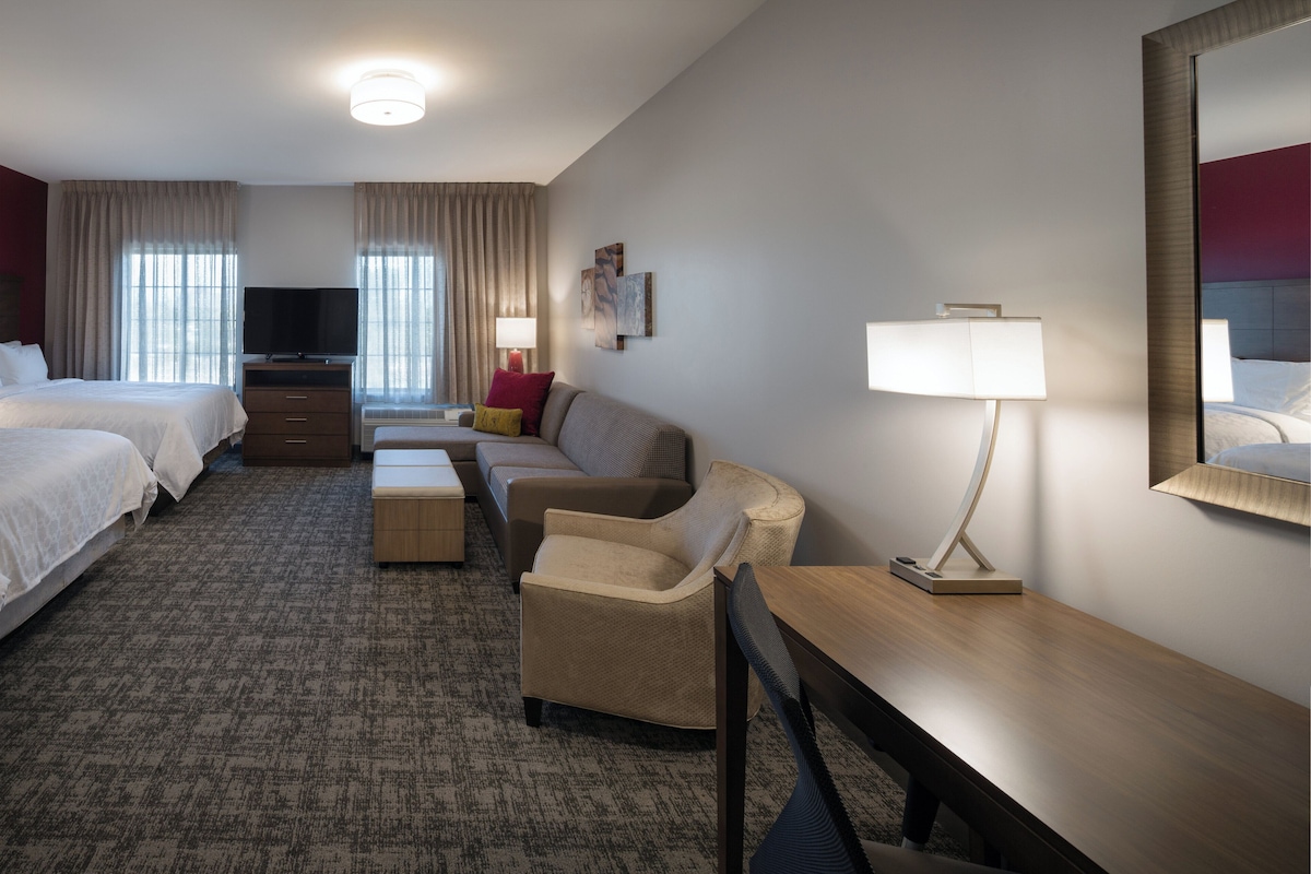 Premium bedding, pillowtop beds, desk, laptop workspace