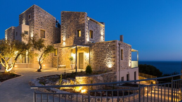 A stone building with a balcony, a pathway, and a railing. - Endless Blue View, Top Beaches Nearby (Rethymno)