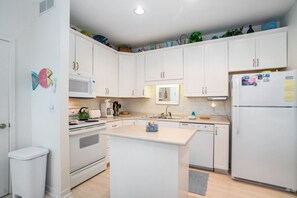 Dishwasher, coffee/tea maker, cookware/dishes/utensils