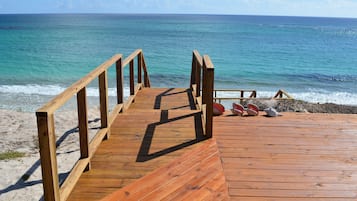 On the beach, sun-loungers, beach towels