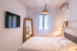 3 chambres, coffres-forts dans les chambres, fer et planche à repasser