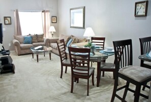 Townhome, Multiple Beds, Kitchen, Garden View (Venetian Bay Townhome) | Living area | 40-inch flat-screen TV with cable channels, TV