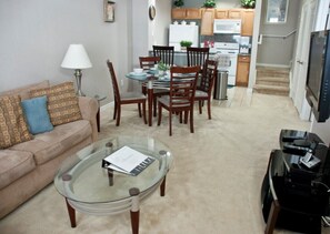Townhome, Multiple Beds, Kitchen, Garden View (Venetian Bay Townhome) | Living area | 40-inch flat-screen TV with cable channels, TV - Venetian Bay #103 - Three Bedroom Townhome (Kissimmee)
