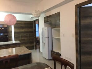 Apartment, 3 Bedrooms | Private kitchen | Full-size fridge, rice cooker