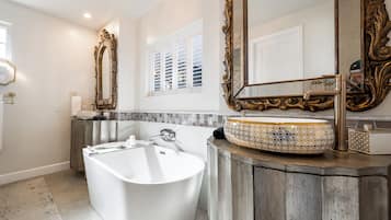 Shower, hair dryer, bathrobes, towels