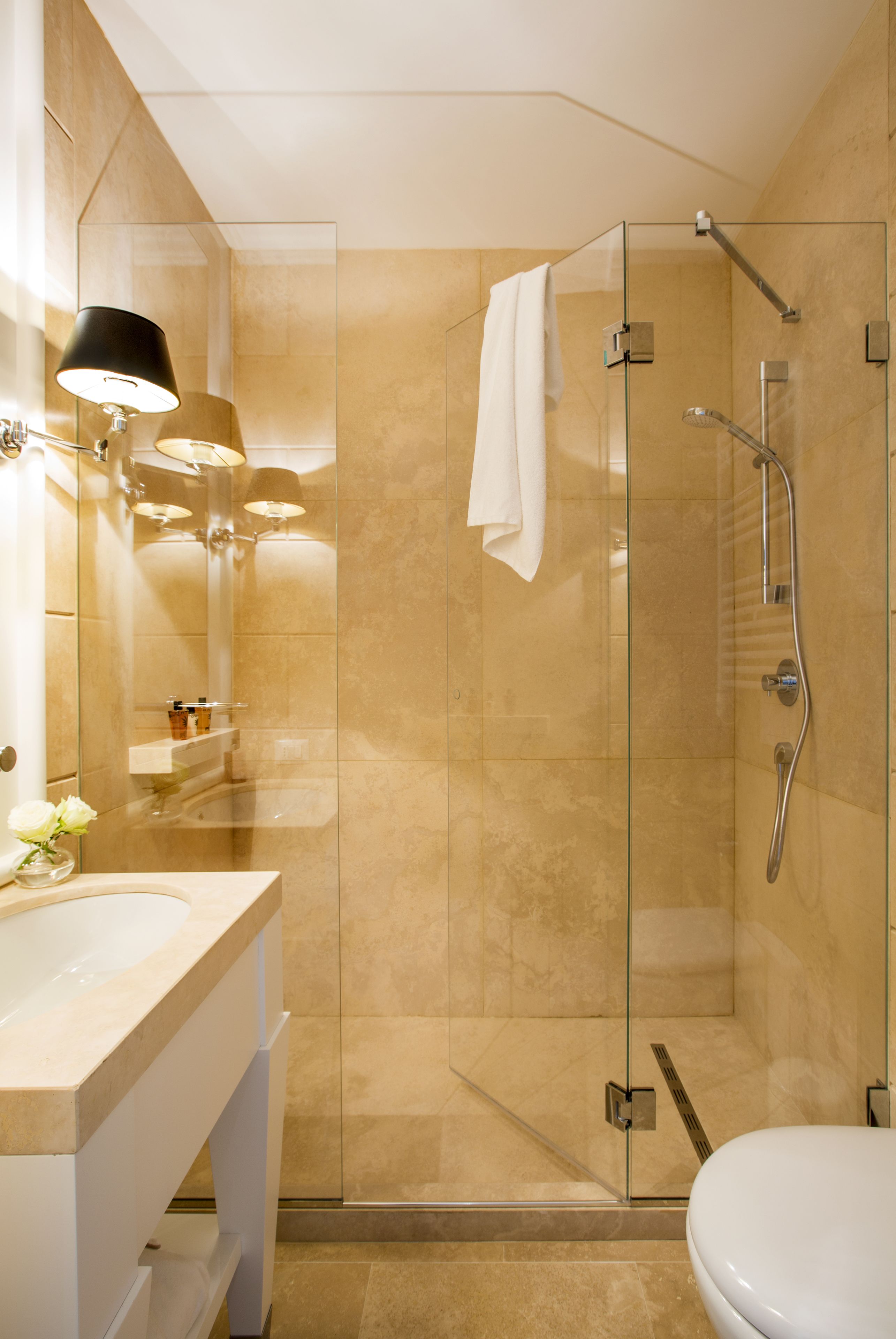 Shower, designer toiletries, hair dryer, slippers