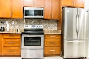 Fridge, microwave, oven, stovetop - Hamptons @ Fairway Unit #3 (New Kingston)