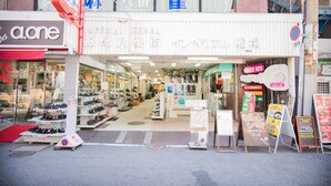 A storefront with a shoe display outside. - Imperial-Semba (Osaka)