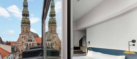 Deluxe Room, 1 King Bed, City View | In-room safe, desk, laptop workspace, blackout curtains