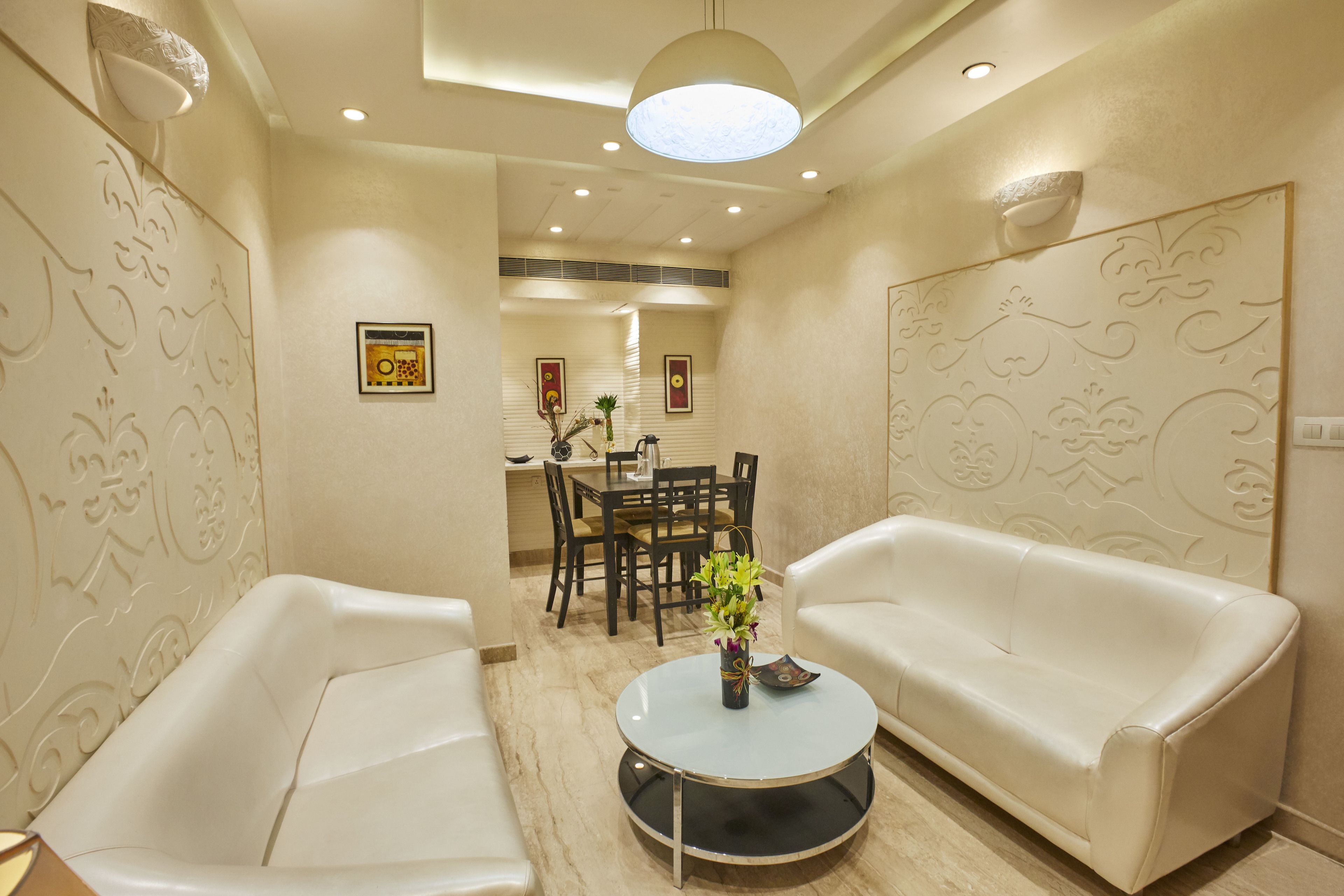 Executive Deluxe Room | Living room | TV