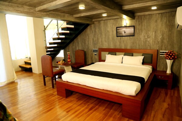 Rideaux occultants, chambres insonorisées, fer et planche à repasser