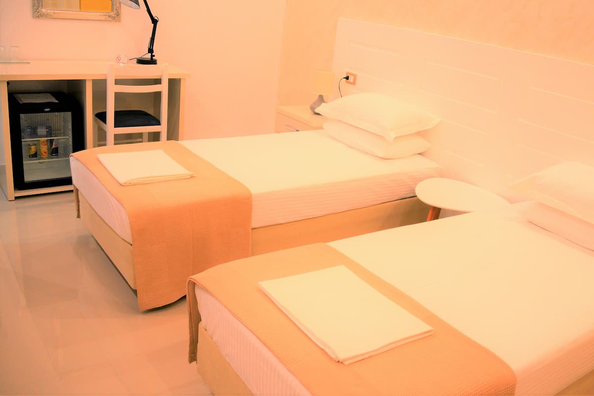 Deluxe Twin Room | 1 bedroom, premium bedding, down comforters, memory foam beds