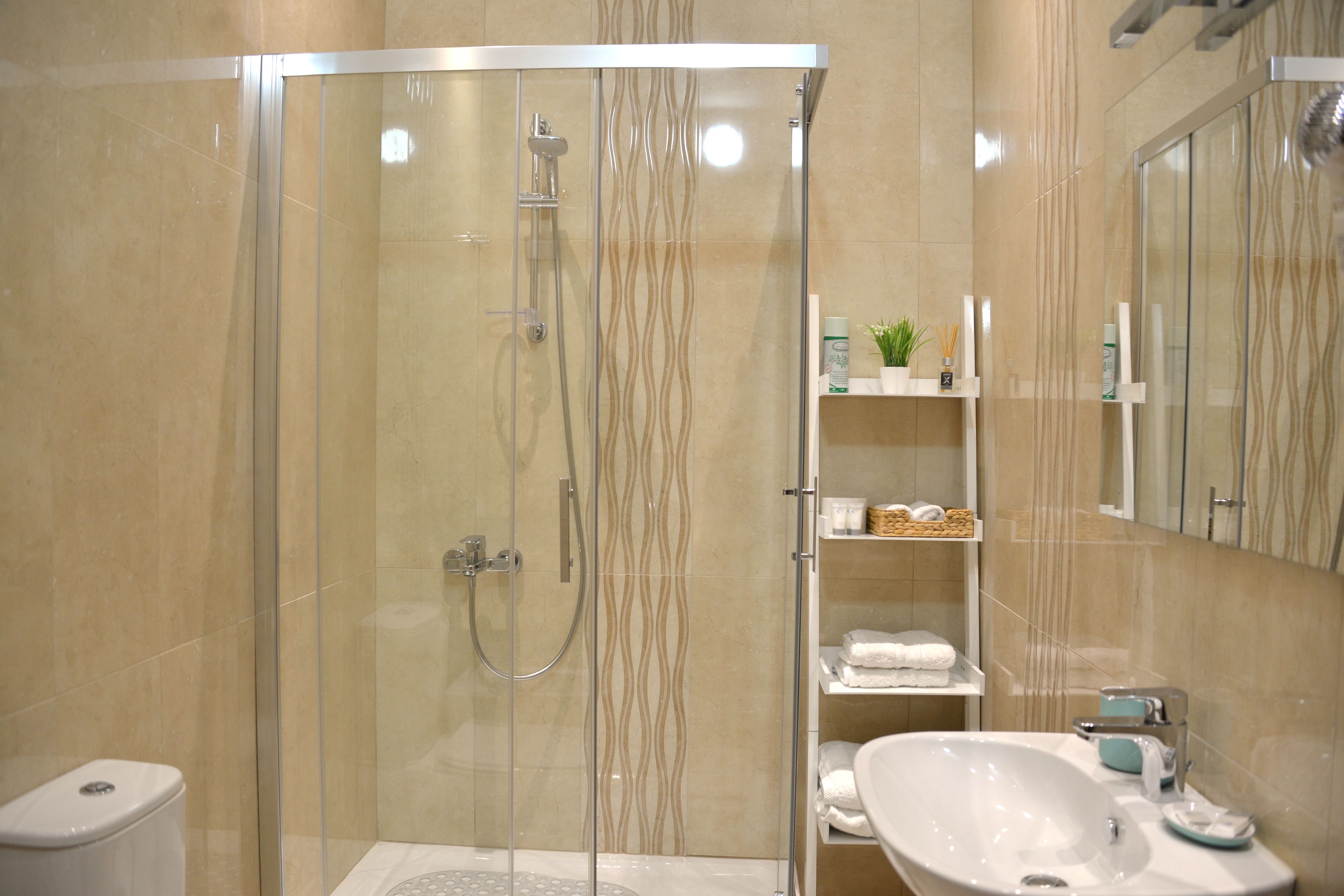 Shower, free toiletries, hair dryer, slippers
