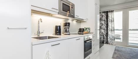 Apartment, 1 Bedroom, Balcony | Private kitchen | Fridge, microwave, oven, stovetop