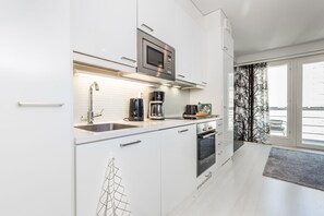 Apartment, 1 Bedroom, Balcony | Private kitchen - Go Happy Home Apartment Mikonkatu 11 55 (Helsinki)