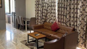 Luxury Apartment, 1 Bedroom, Accessible, City View | Living area | 32-inch LED TV with digital channels, TV