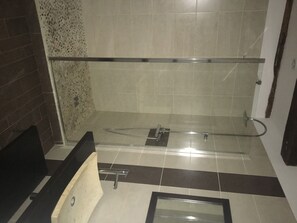 Bathtub, hair dryer, towels, soap