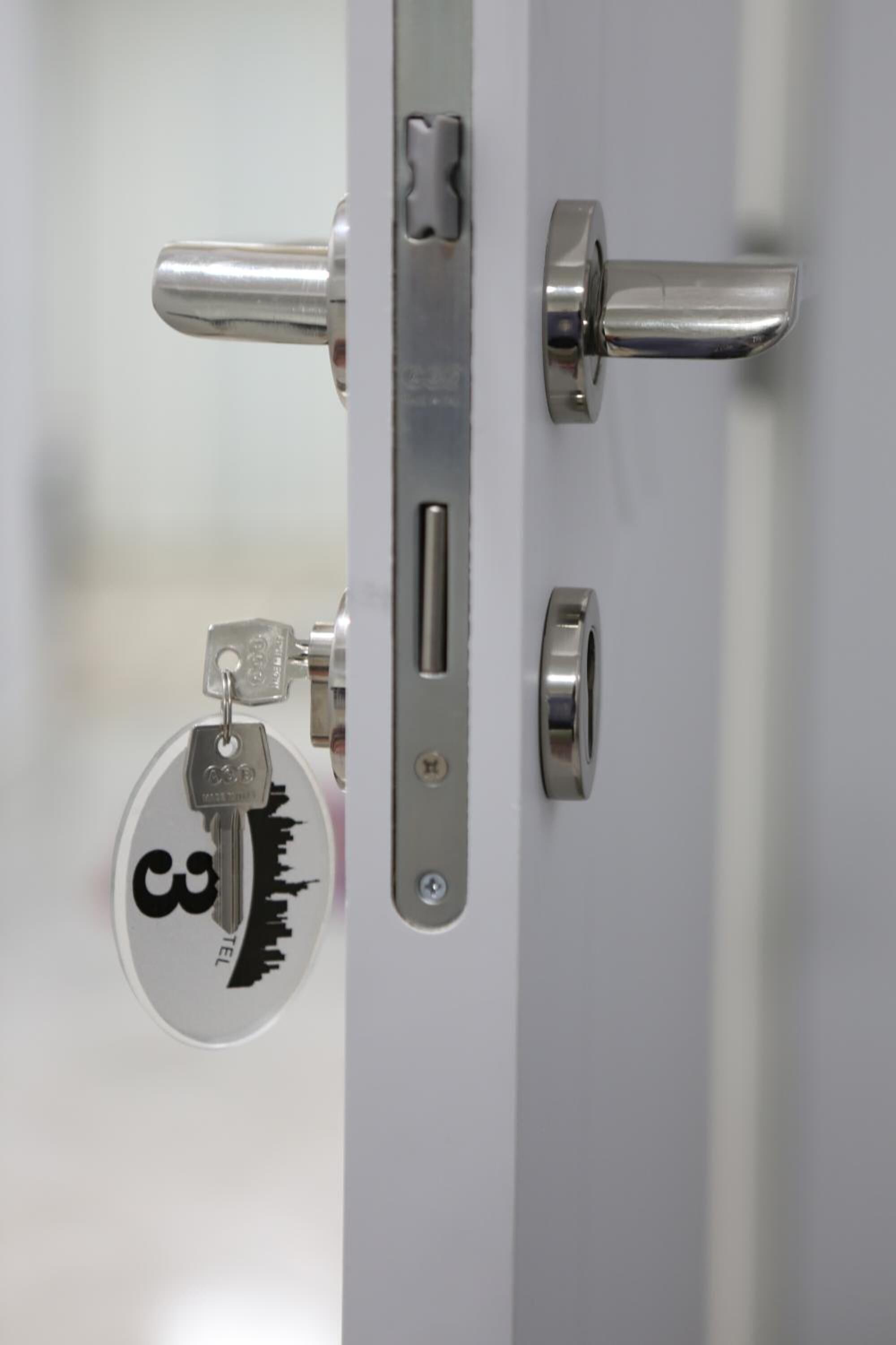 shower, hair dryer, bathrobes, slippers