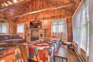 TV, fireplace, books