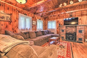 TV, fireplace, books
