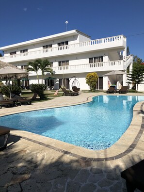Outdoor pool, sun loungers