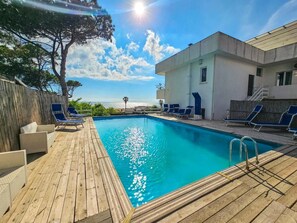 Seasonal outdoor pool, open 8:00 AM to 6:00 PM, sun loungers