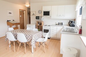 Full-sized fridge, microwave, oven, espresso maker